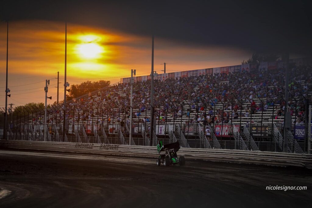 Packed grandstand on the backstretch